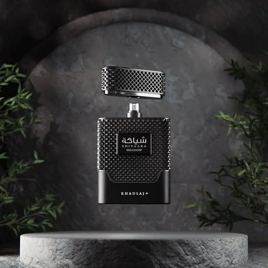 Khadlaj Shiyaaka Shadow 100 ml (3.4 oz) bottle – citrus aromatic opening over spicy woods and amber musk woody base.