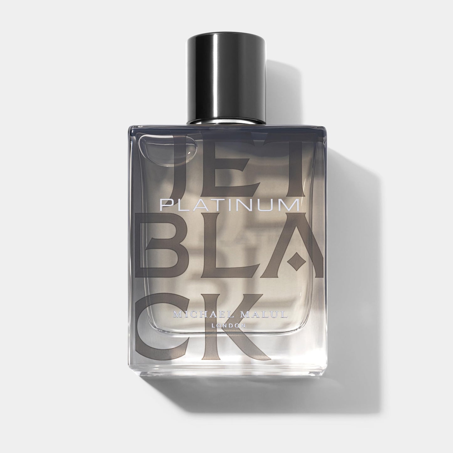 Michael Malul Jet Black Platinum Eau de Parfum 100 ml bottle – fresh citrus fragrance with aromatic spices and smooth woody amber base