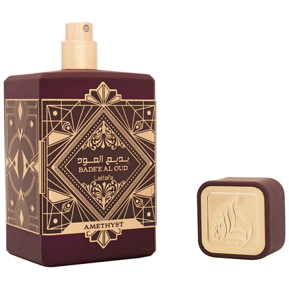 Lattafa Bade’e Al Oud Amethyst 100 ml bottle with cap removed on white background