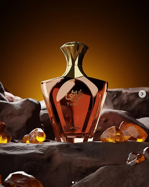 Afnan Turathi Brown 100 ml (3.4 oz) bottle – rich woody resin fragrance with deep amber musk base.