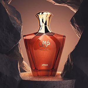 Afnan Turathi Brown 100 ml (3.4 oz) bottle – rich woody resin fragrance with deep amber musk base.