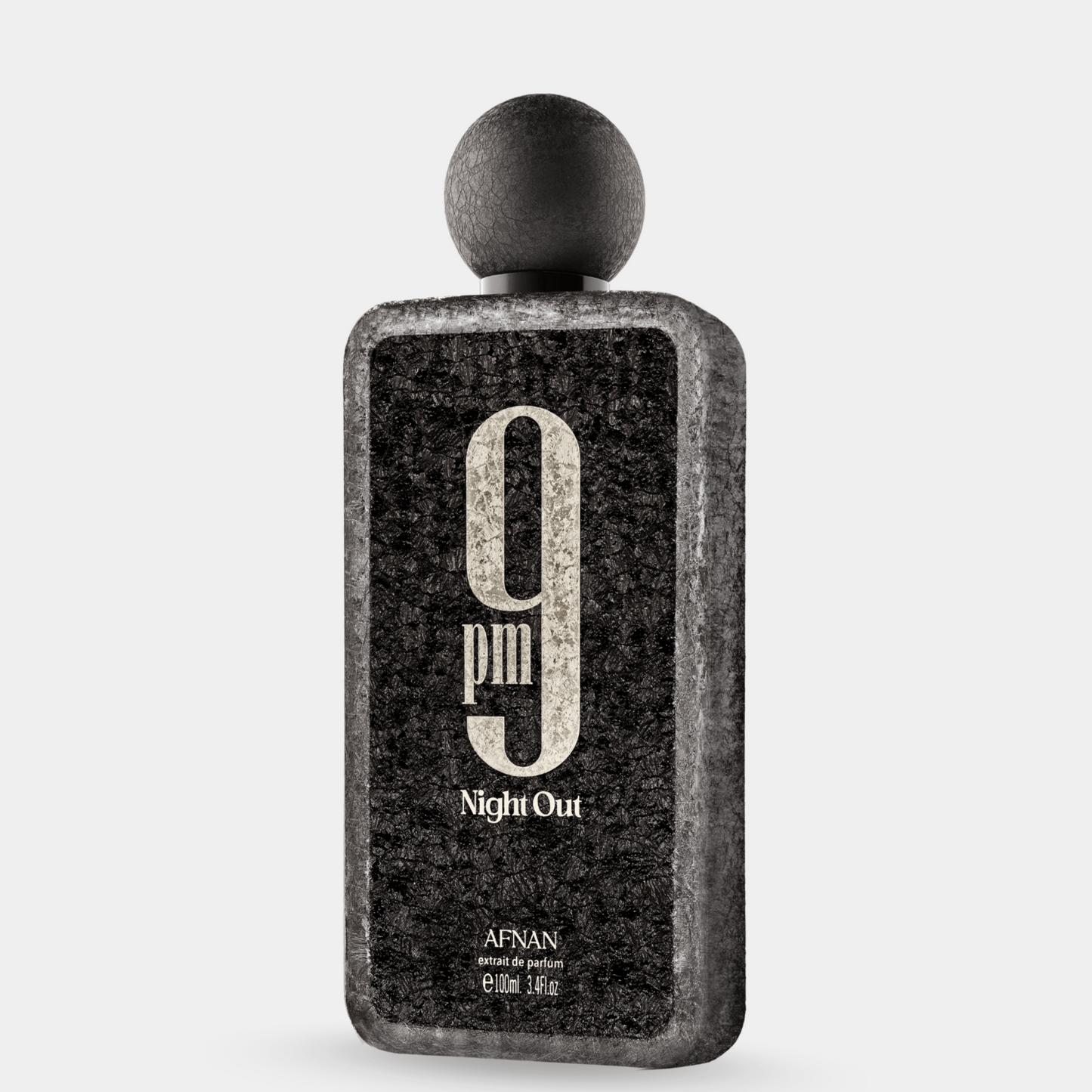Perfume bottle labeled '9 PM Night Out' by Afnan on a light gray background