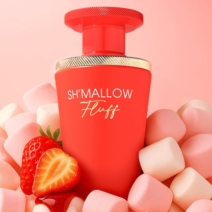 Red bottle labeled 'SH'MALLOW Fluff' surrounded by marshmallows, strawberries, and pink background