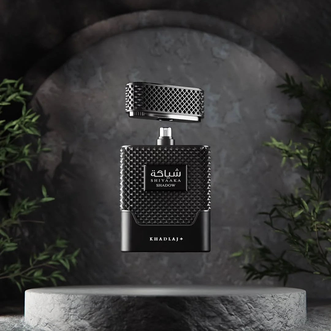 Khadlaj Shiyaaka Shadow 100 ml (3.4 oz) bottle – citrus aromatic opening over spicy woods and amber musk woody base.