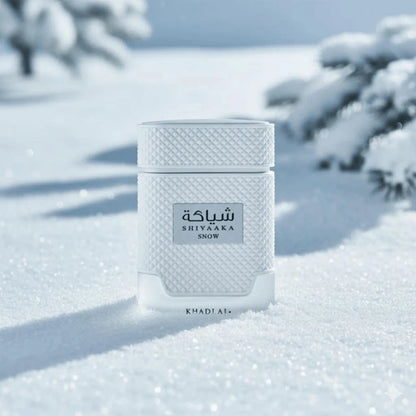Khadlaj Shiyaaka Snow 100 ml (3.4 oz) bottle – icy mint citrus opening over clean musk and soft woods base.