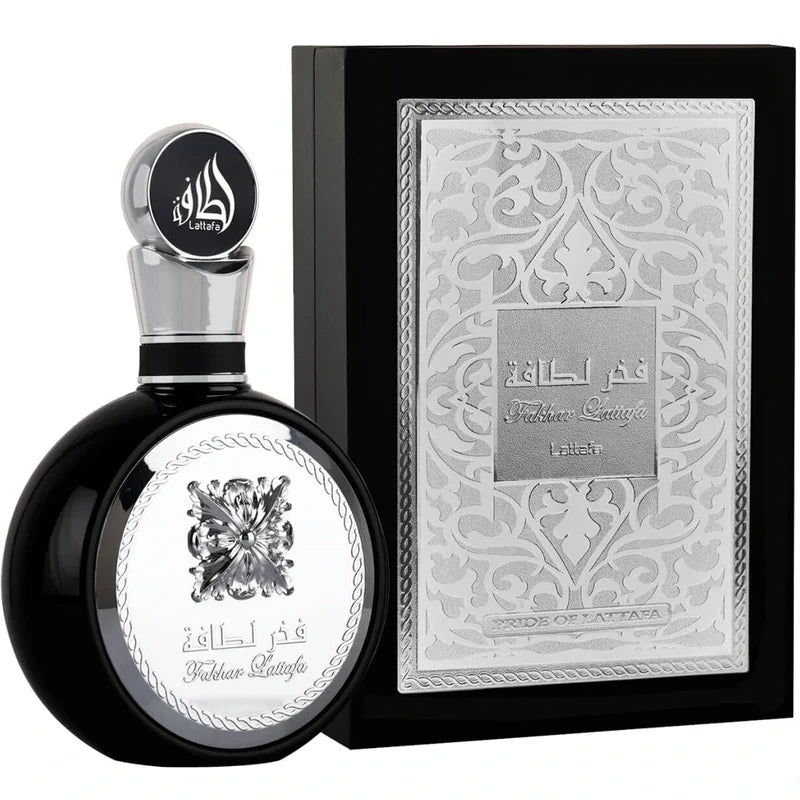 Lattafa Fakhar Black 100 ml bottle – fresh aromatic men’s fragrance with apple, lavender, and woody amber base.