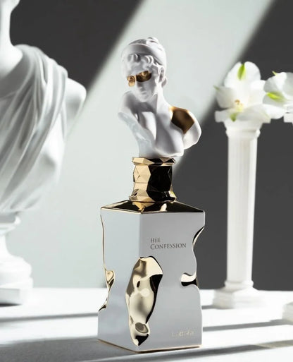 Lattafa Her Confession Eau de Parfum 100 ml bottle – warm floral gourmand fragrance with vanilla, cinnamon, white florals, and musky tonka base