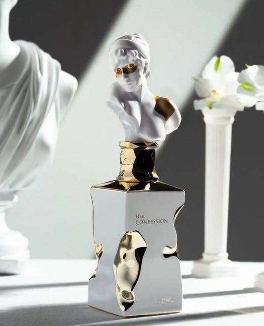 Lattafa Her Confession Eau de Parfum 100 ml bottle – warm floral gourmand fragrance with vanilla, cinnamon, white florals, and musky tonka base