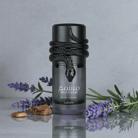 Lattafa Musamam Black Intense Eau de Parfum 100 ml bottle – woody aromatic amber fragrance with lavender, cedarwood, tonka bean, and creamy amber woody base
