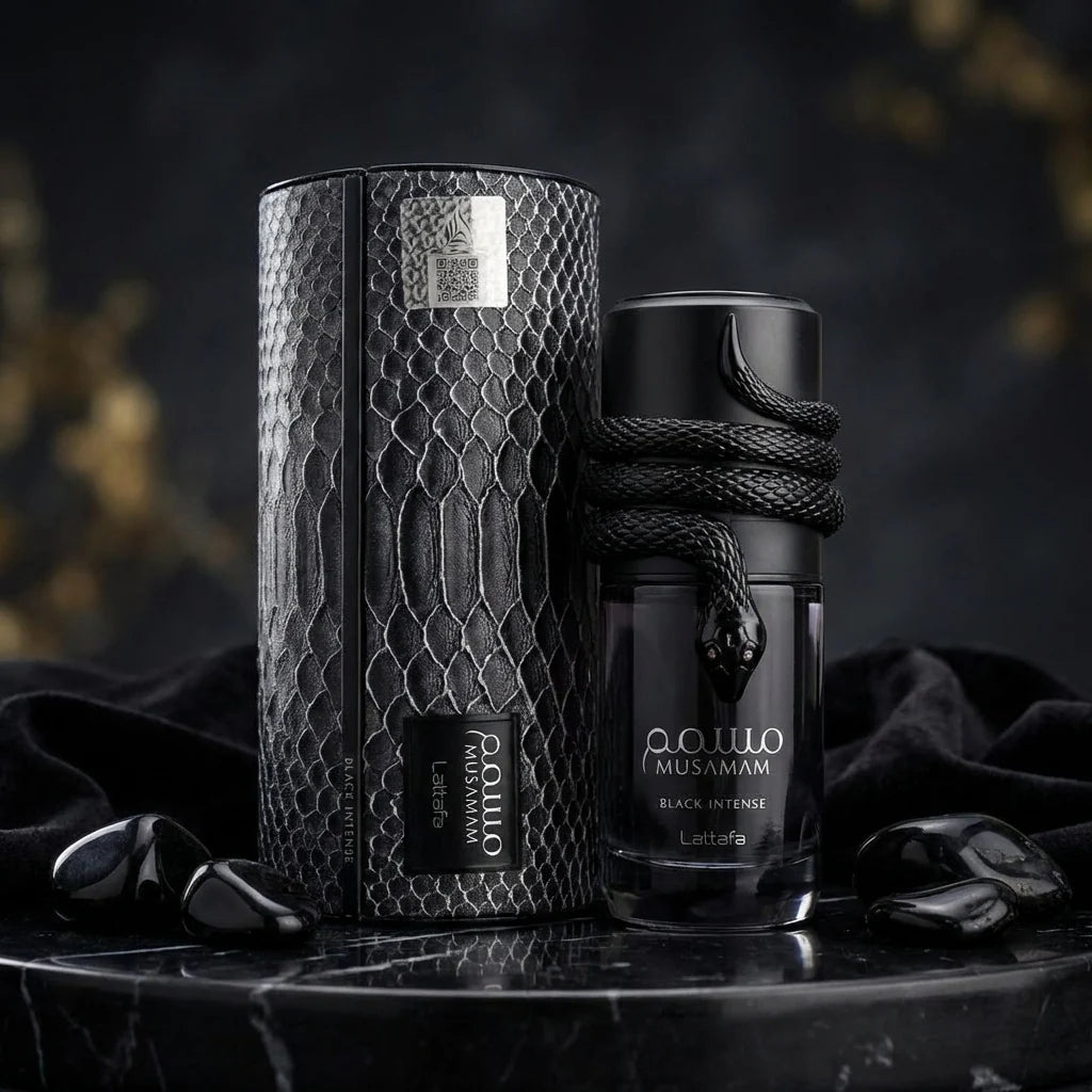 Lattafa Musamam Black Intense Eau de Parfum 100 ml bottle – woody aromatic amber fragrance with lavender, cedarwood, tonka bean, and creamy amber woody base