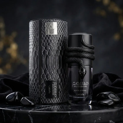 Lattafa Musamam Black Intense Eau de Parfum 100 ml bottle – woody aromatic amber fragrance with lavender, cedarwood, tonka bean, and creamy amber woody base
