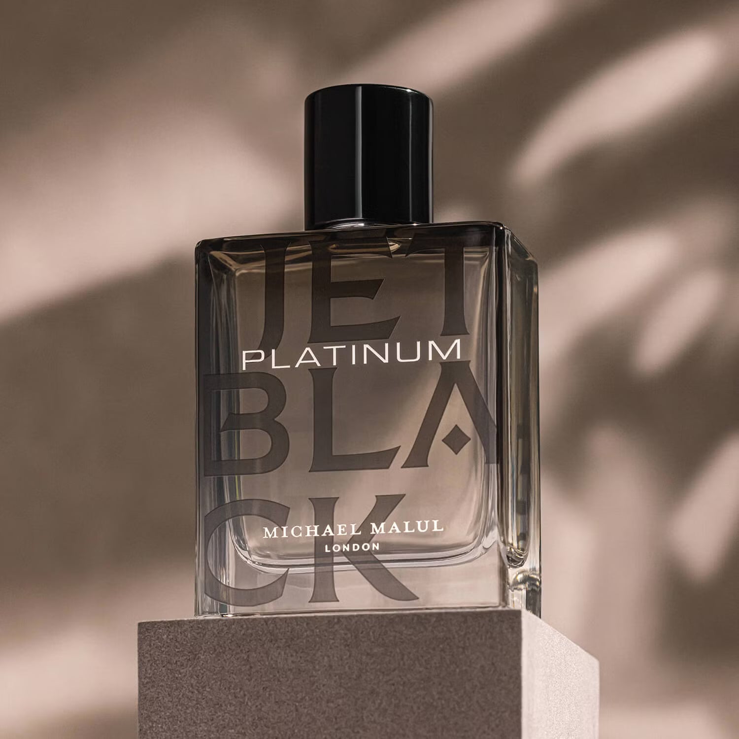 Michael Malul Jet Black Platinum Eau de Parfum 100 ml bottle – fresh citrus fragrance with aromatic spices and smooth woody amber base