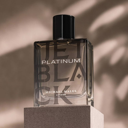 Michael Malul Jet Black Platinum Eau de Parfum 100 ml bottle – fresh citrus fragrance with aromatic spices and smooth woody amber base