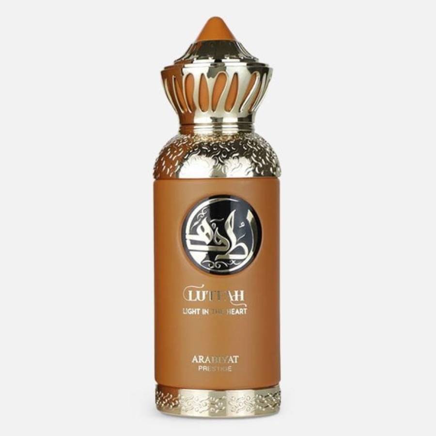 Brown perfume bottle with decorative cap on a white background
