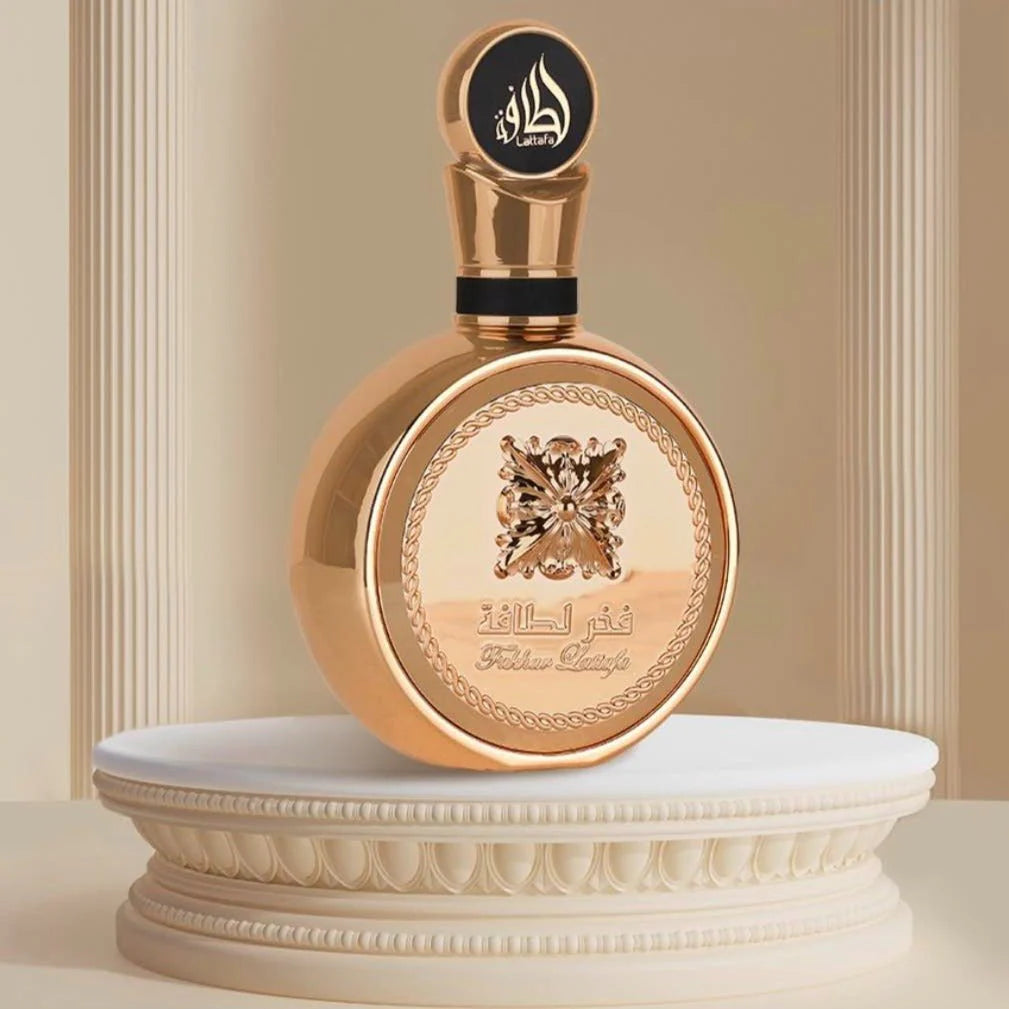 Lattafa Fakhar Gold Extrait Eau de Parfum 100 ml bottle – floral vanilla fragrance with tuberose, amber, cashmeran, leather, and creamy musky base