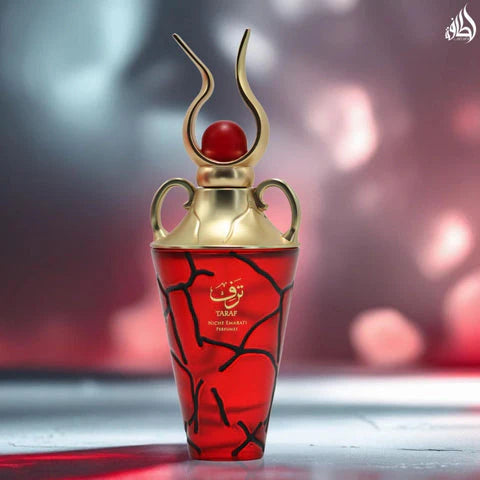 Lattafa Taraf Eau de Parfum 100 ml bottle – fruity floral gourmand fragrance with pear, praline, vanilla, and musky base