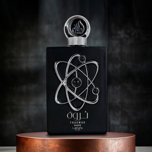 Lattafa Tharwah Silver Eau de Parfum 100 ml bottle – fresh mint and lavender fragrance with creamy vanilla and woody base